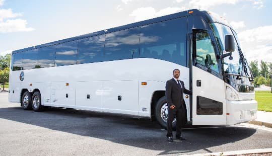Z Charters bus and business owner stepping aboard